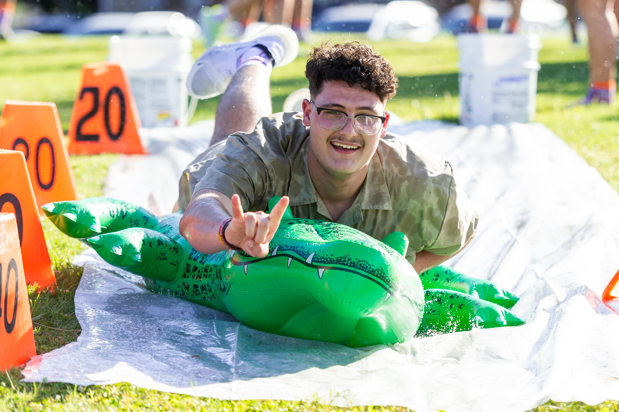 Student enjoying slip-n-slide