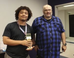 Demon Code War First Place Winner Korbin Richard with Dr. Nicholas Richardson, School of STEM