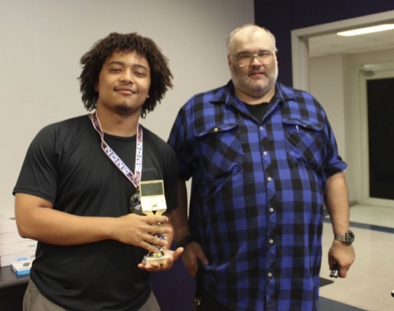 Demon Code War First Place Winner Korbin Richard with Dr. Nicholas Richardson, School of STEM
