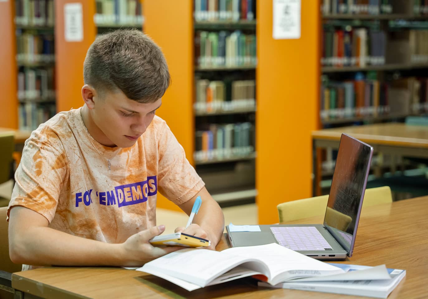 NSU Student studying in the Library