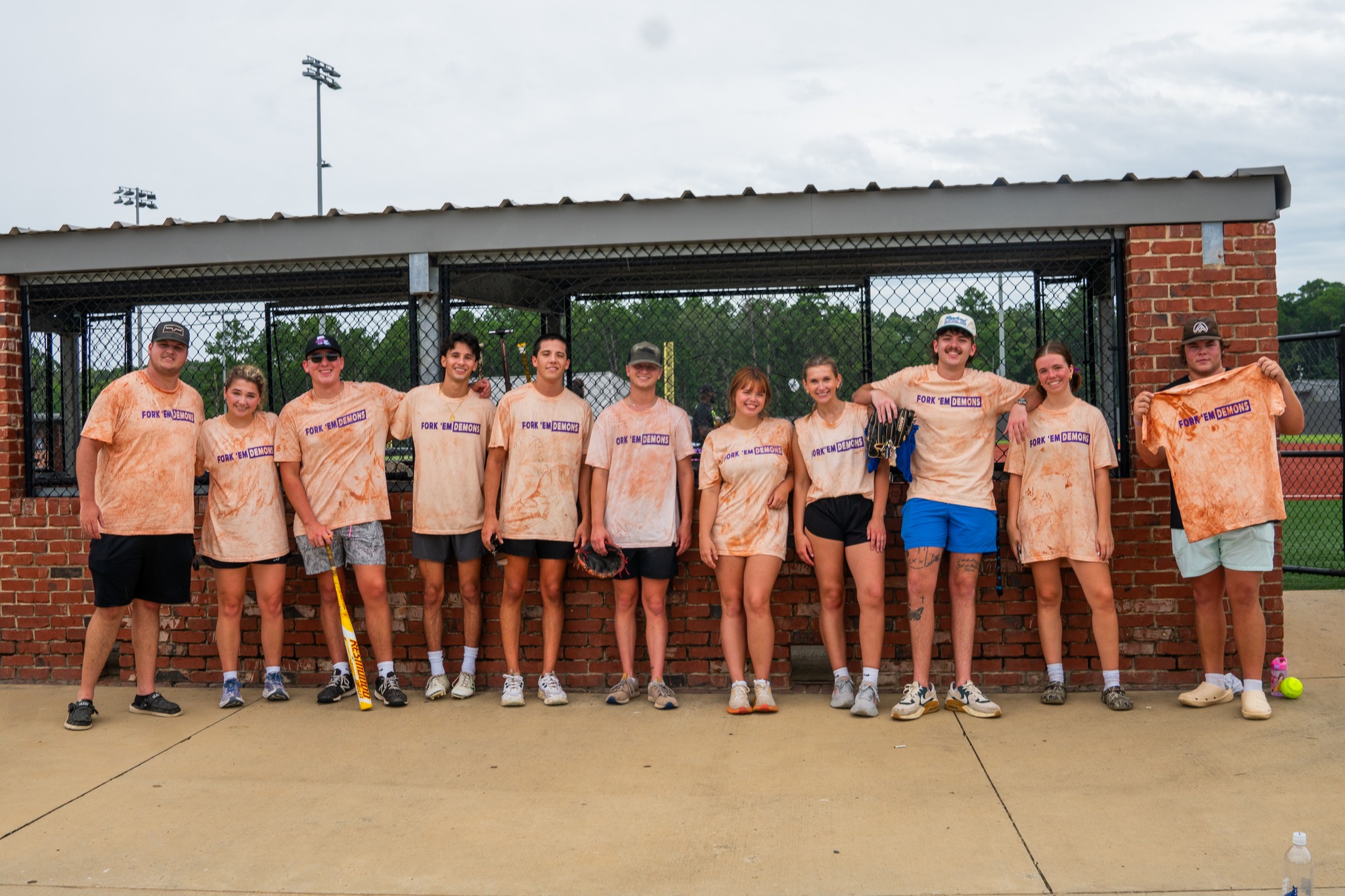 An Intramural softball team poses for a photo after their game