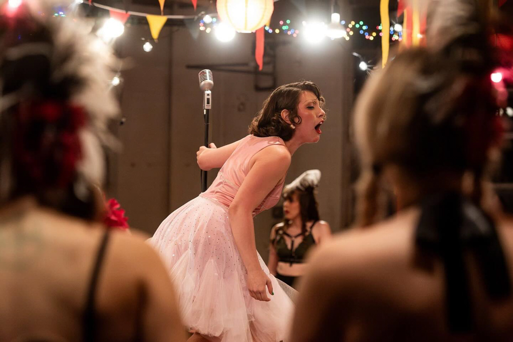NSU Theatre student performs onstage during a show