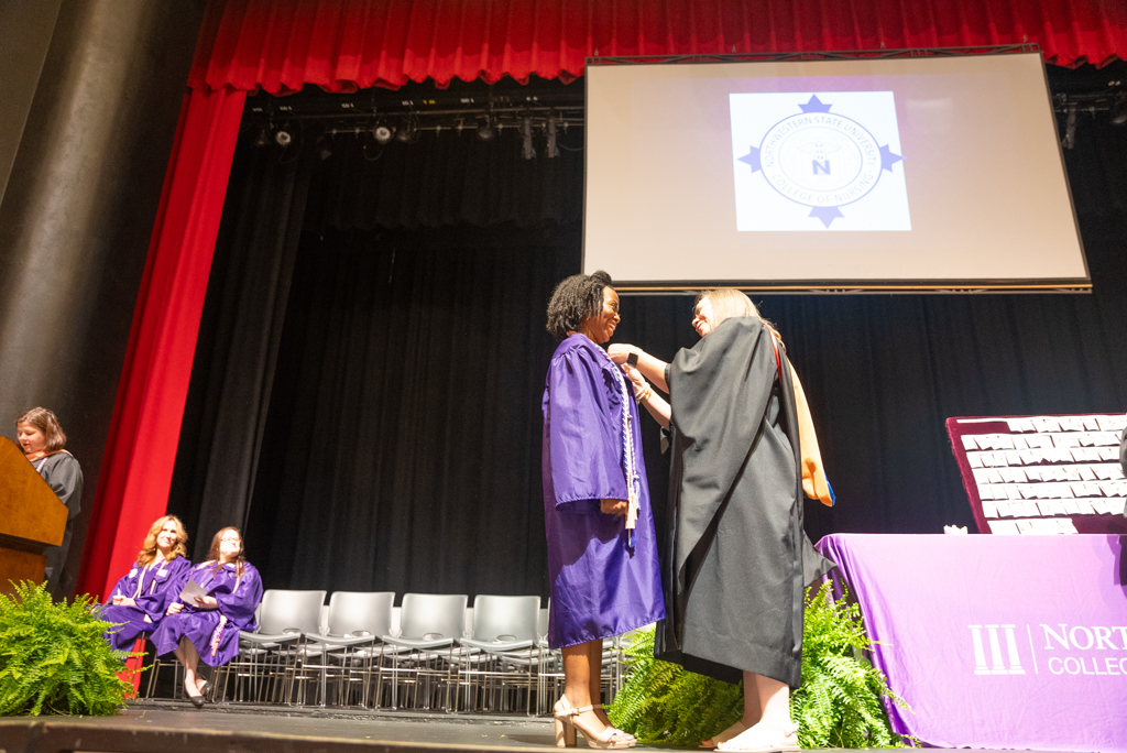 NSU Nursing Graduate during a pinning ceremony