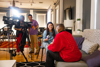 NSU communication student interviewing a person