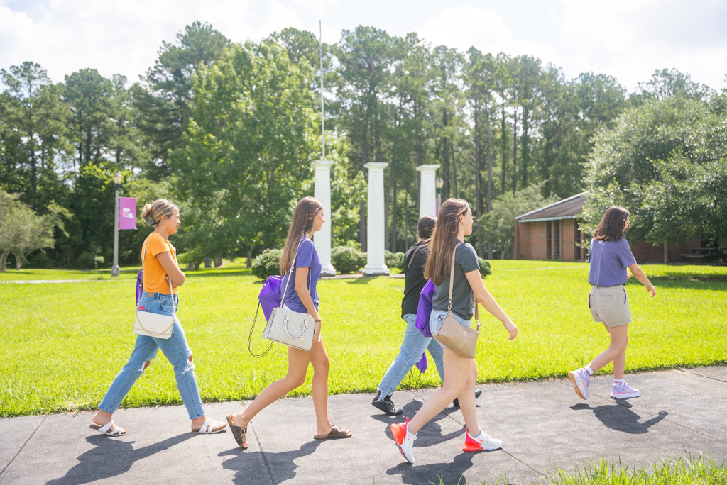 A group of NSU students walk to class at the Leesville campus