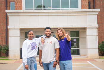 NSU students in front of Jimmy D Long Student Services Center