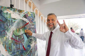 NSU faculty member at art showcase.