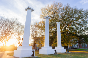 3 Columns on Normal Hill at sunrise