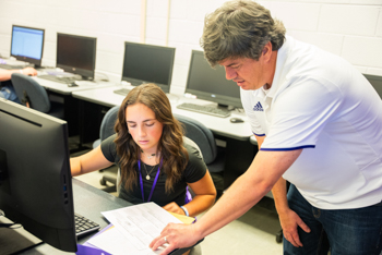 NSU student gets help from professor regarding class scheduling.
