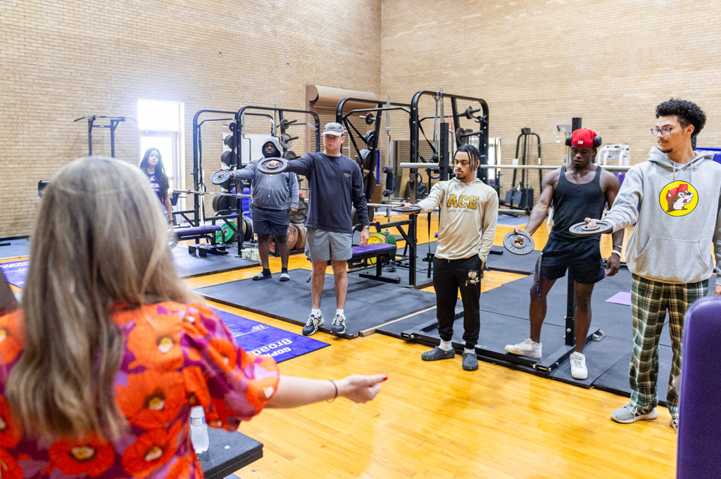 NSU Human Performance students learn from faculty in fitness gym