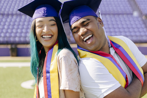 Two NSU International Students celebrating graduation at NSU.