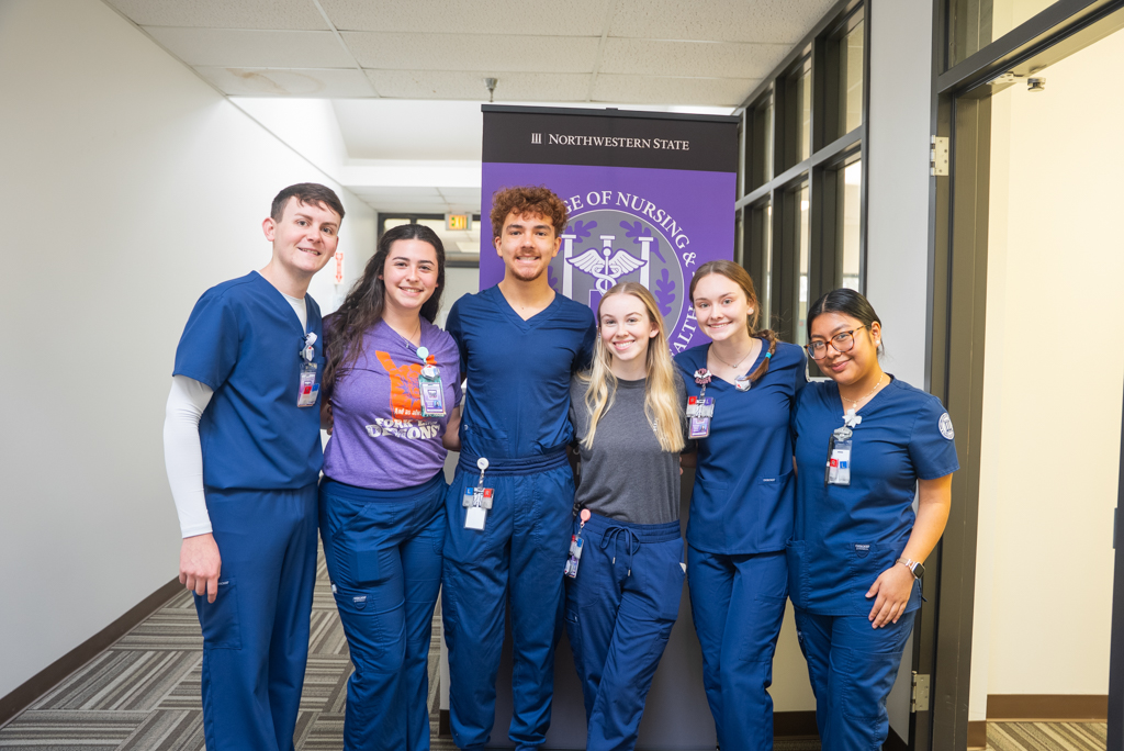 A group of NSU nursing students pose for a photo