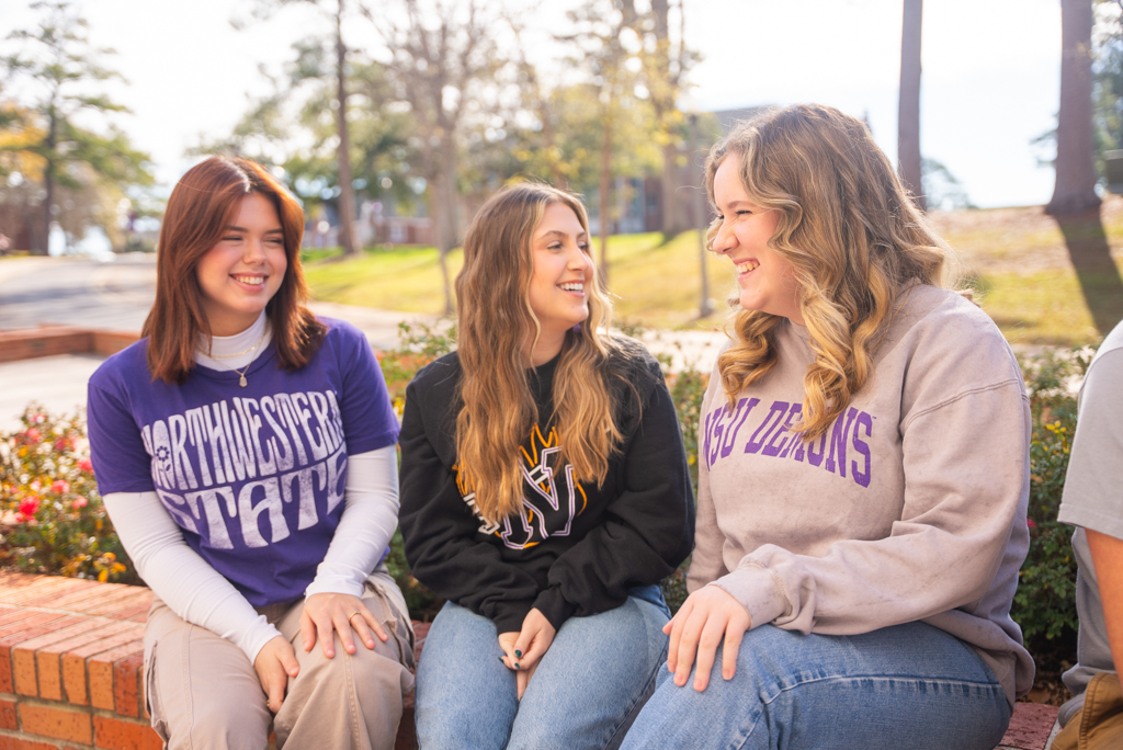 NSU students sit outside the Student Union