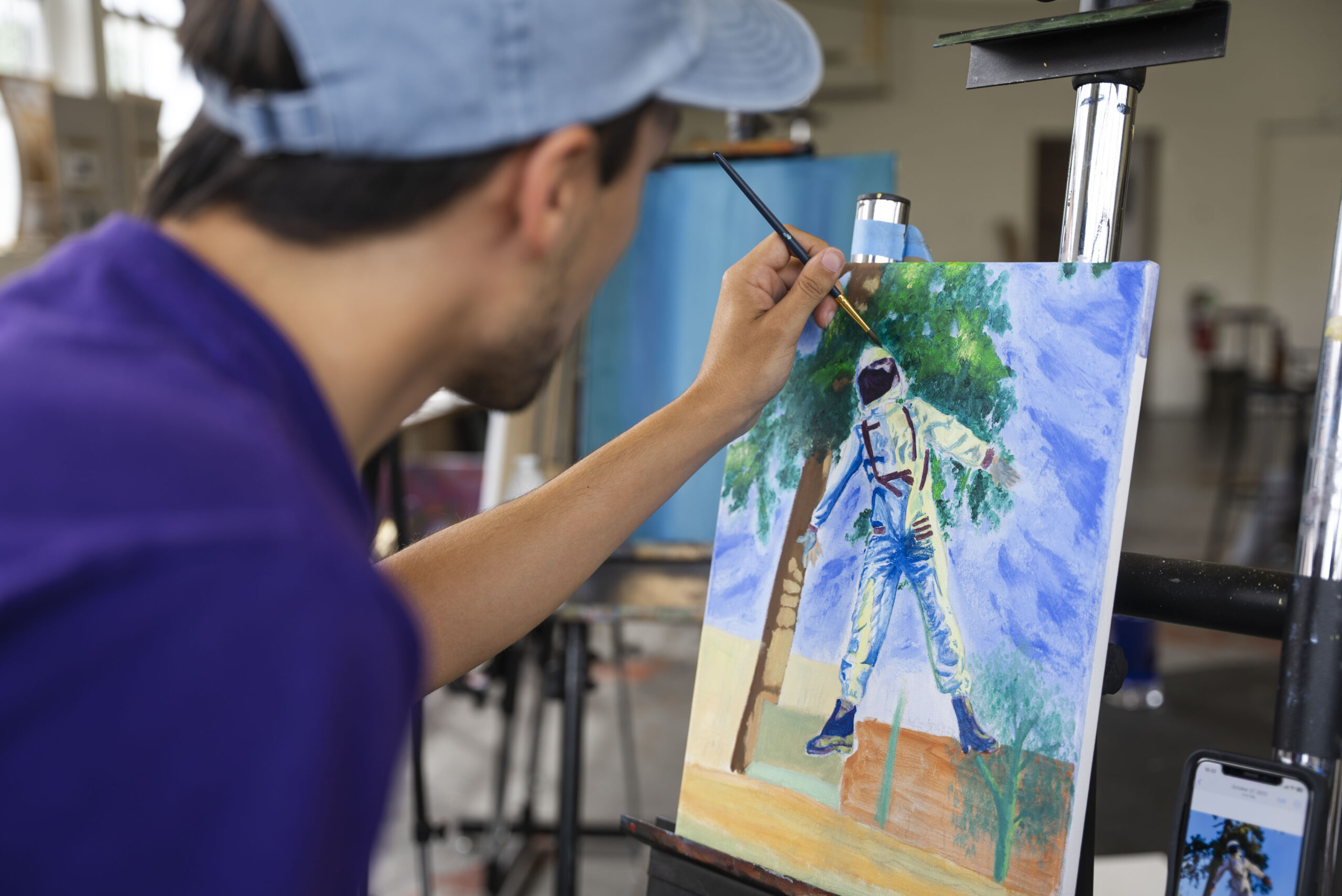 NSU students works on painting project