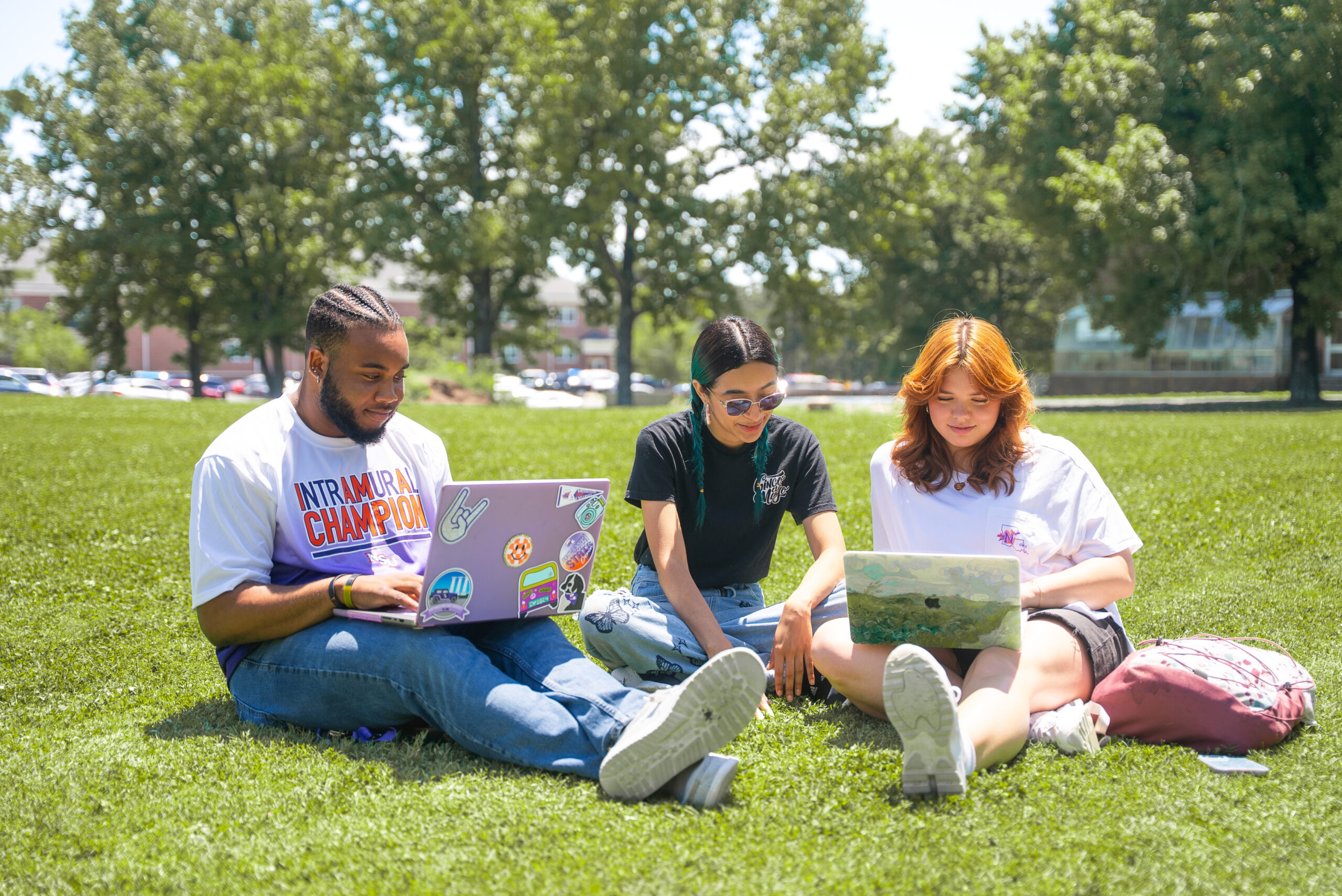 NSU students study together on campus lawn