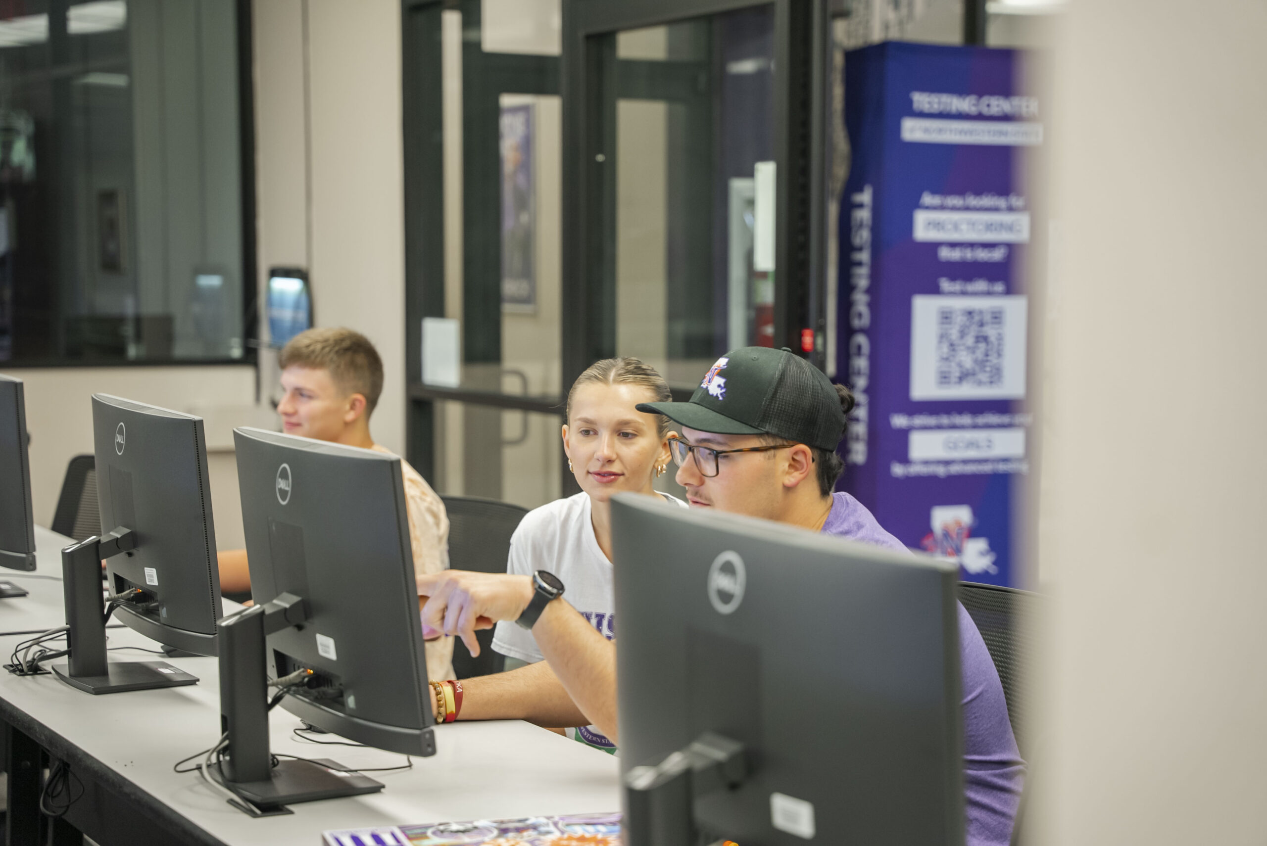 2 NSU students work in the computer lab