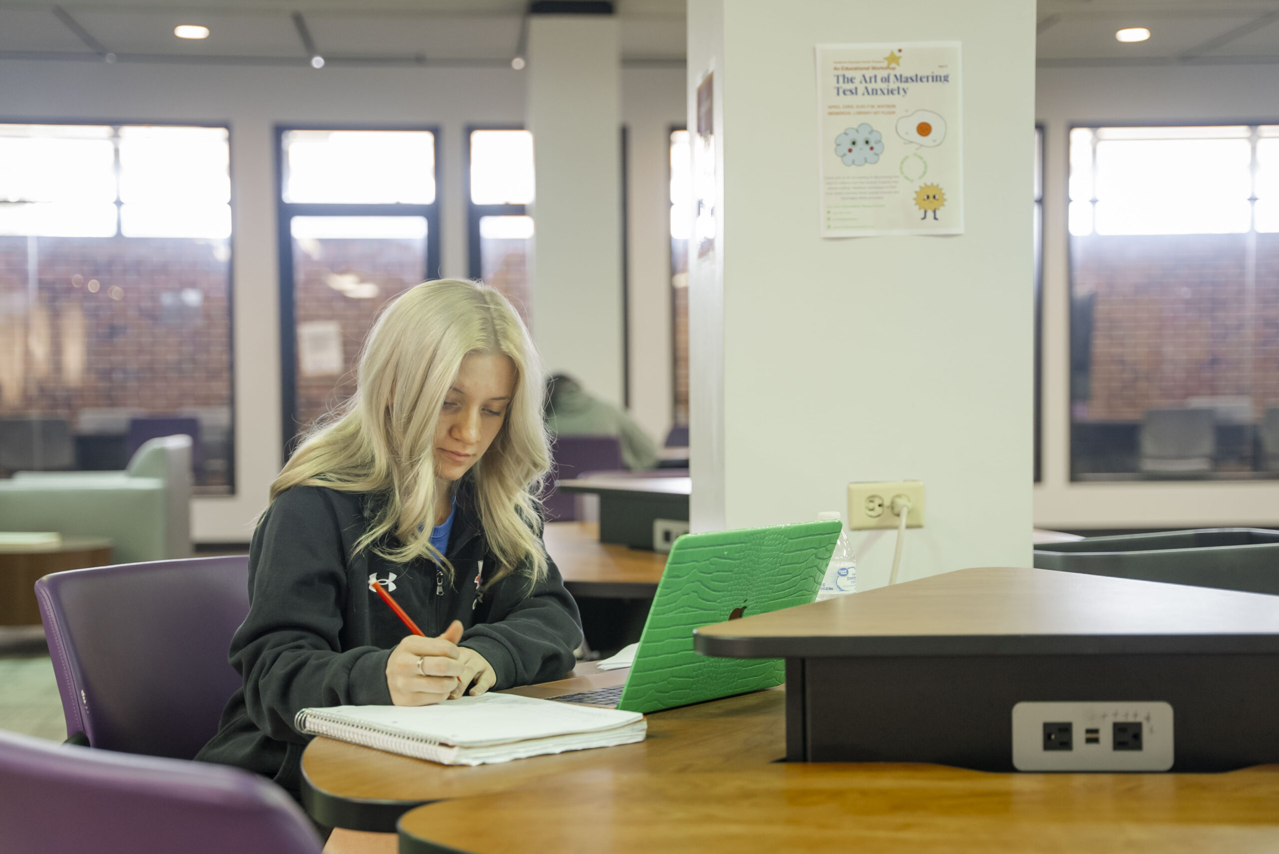 Student completing homework in the Academic Success Center