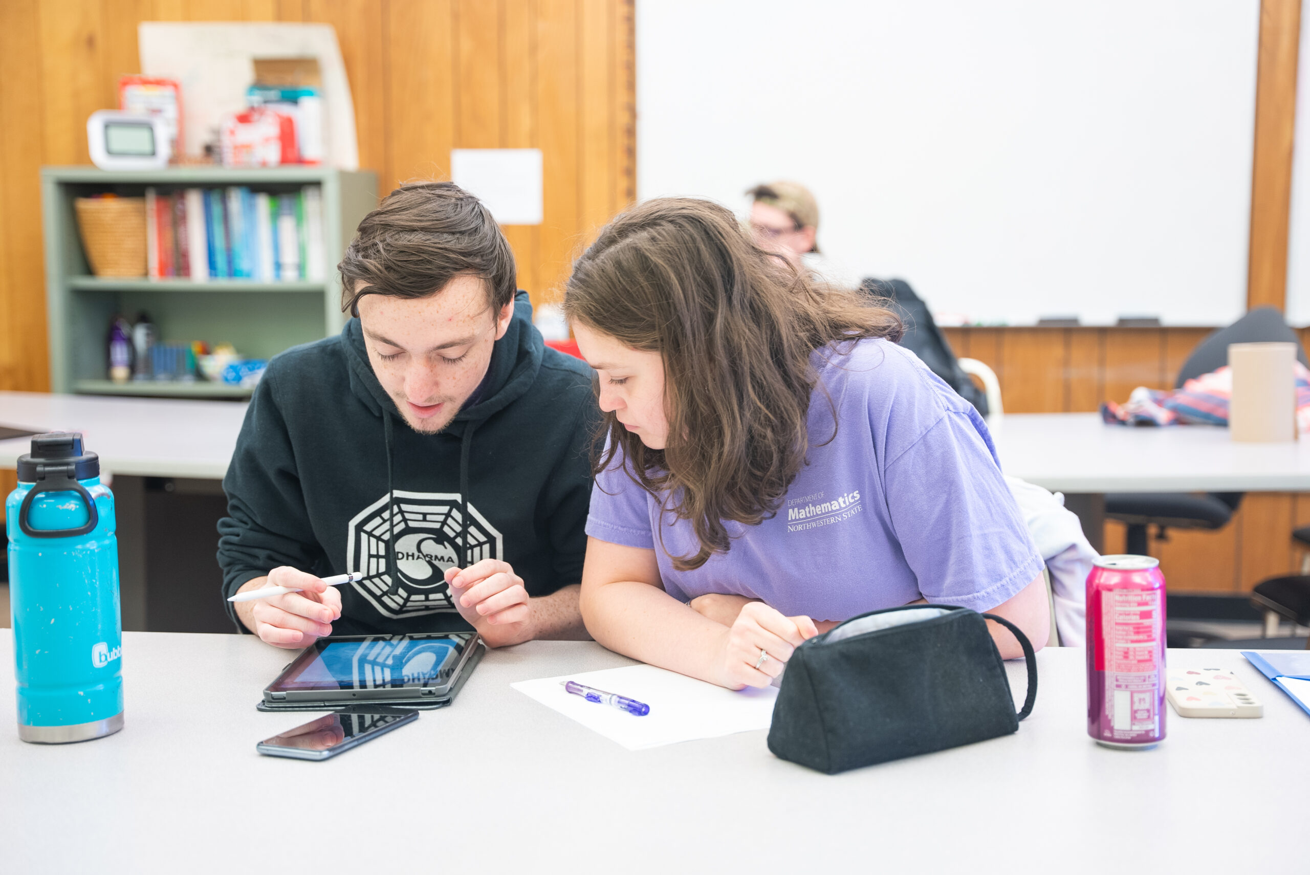 Students work together in class