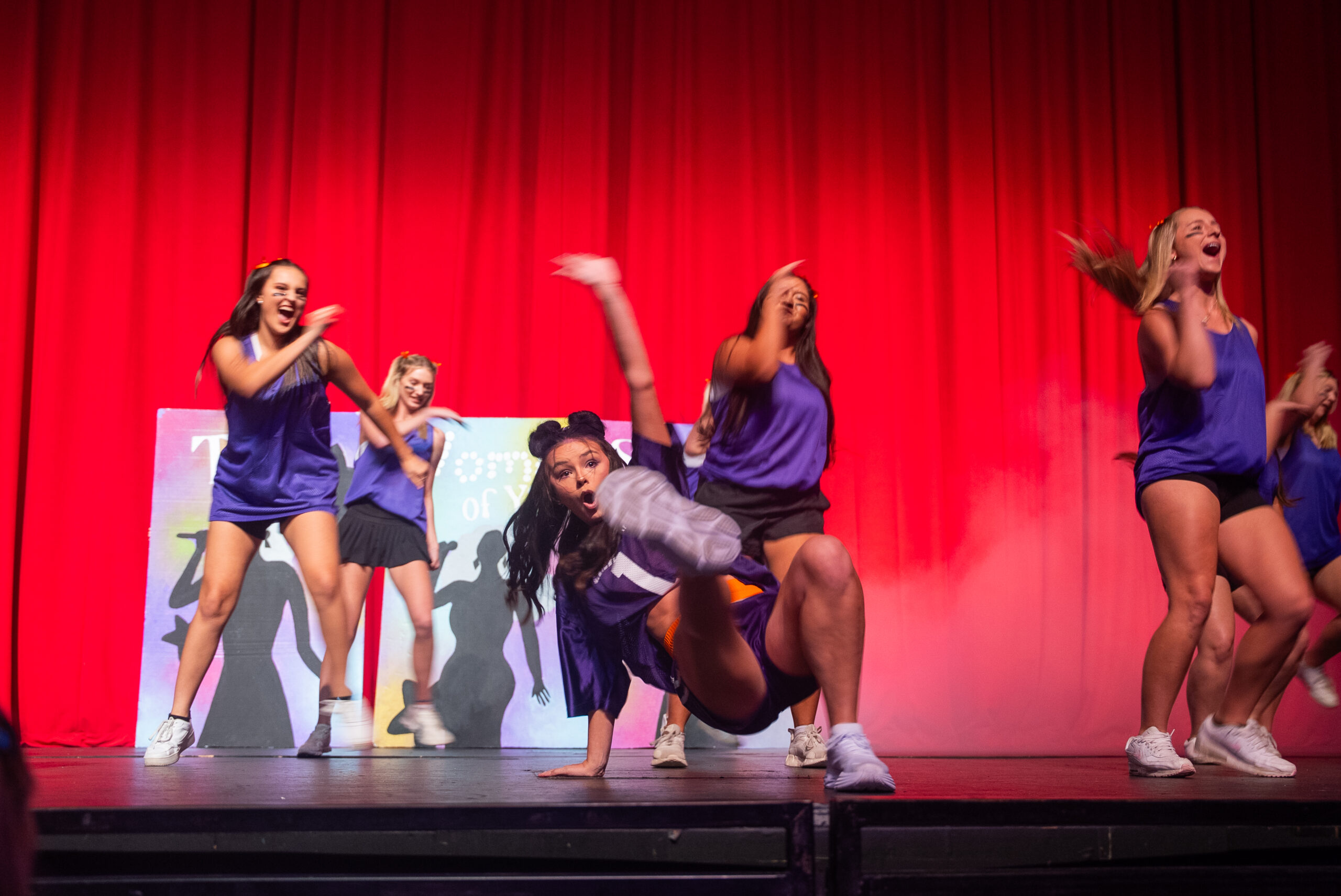 A group of NSU students performing on stage for the annual Lip Sync competition