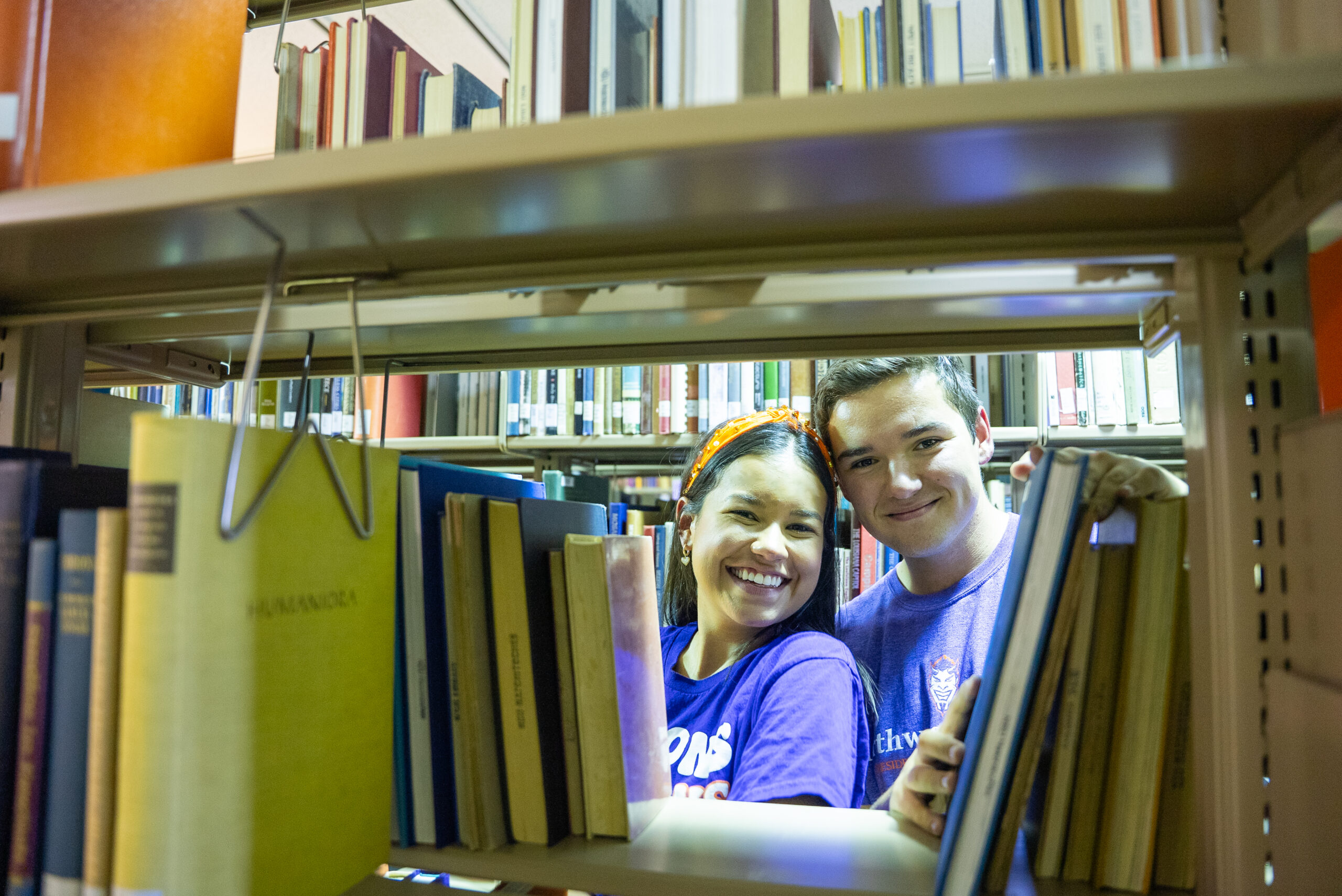 NSU students pose for a photo in the library