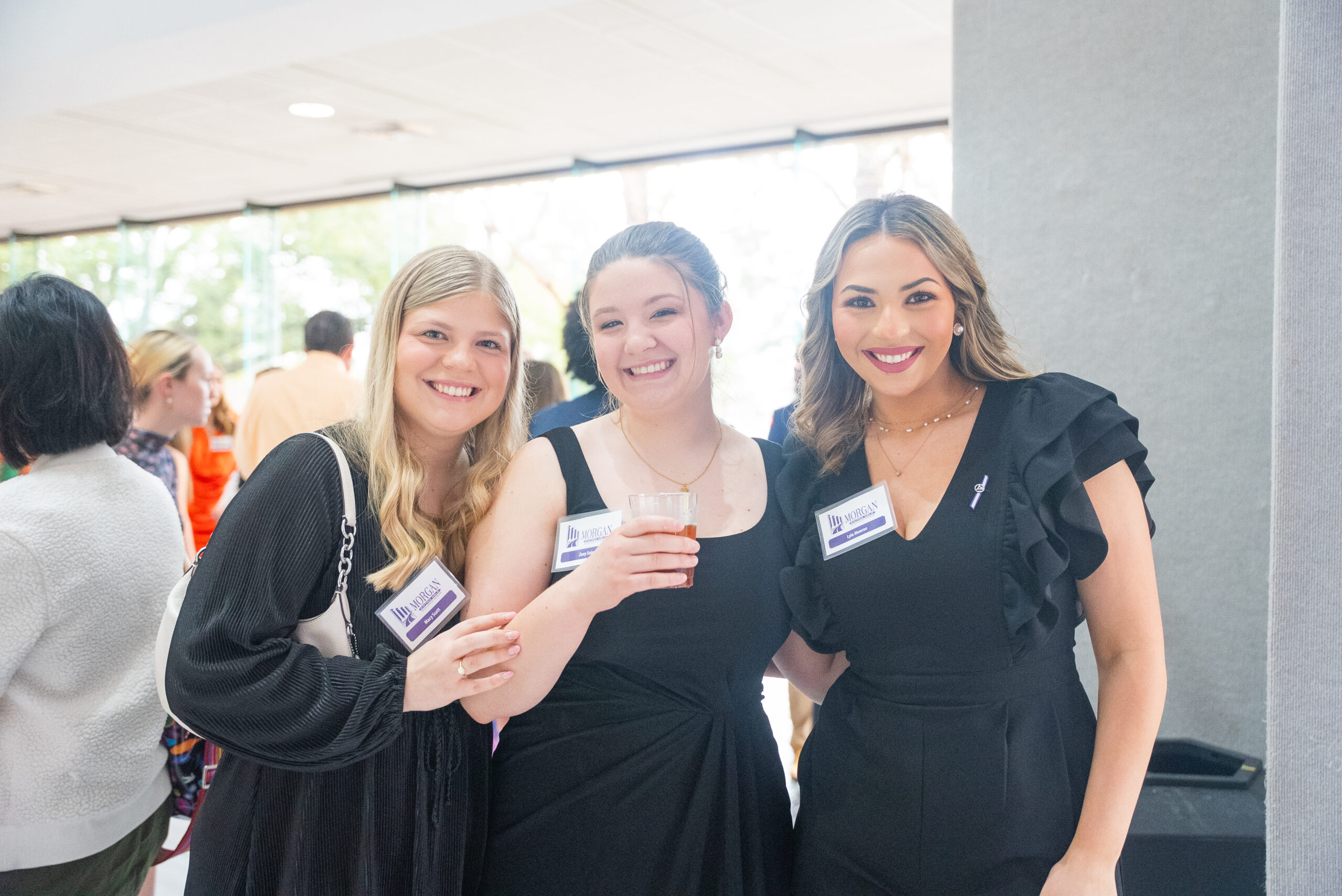 3 students pose for a photo at a Greek Scholarship Banquet