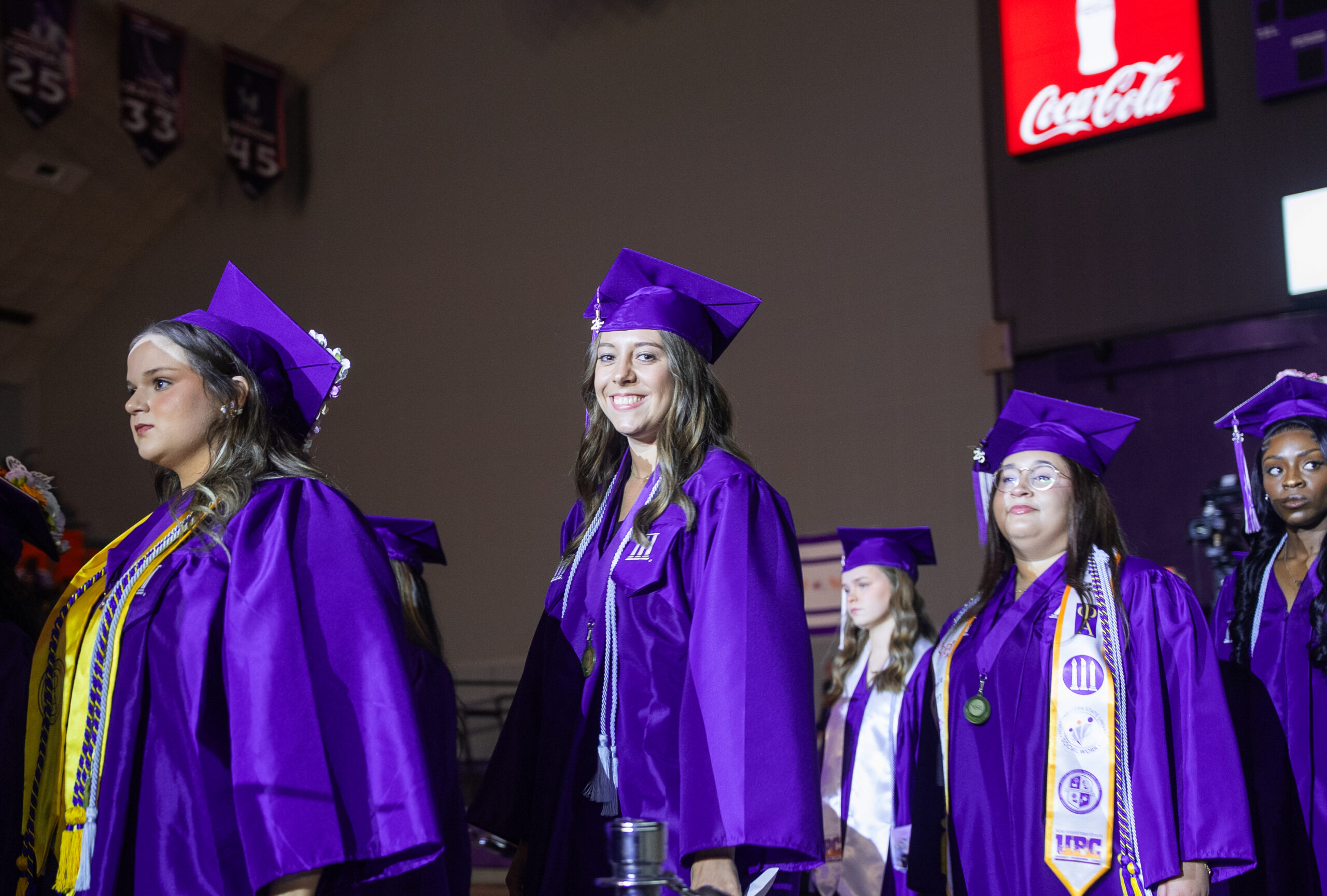 NSU Graduate entering the coliseum