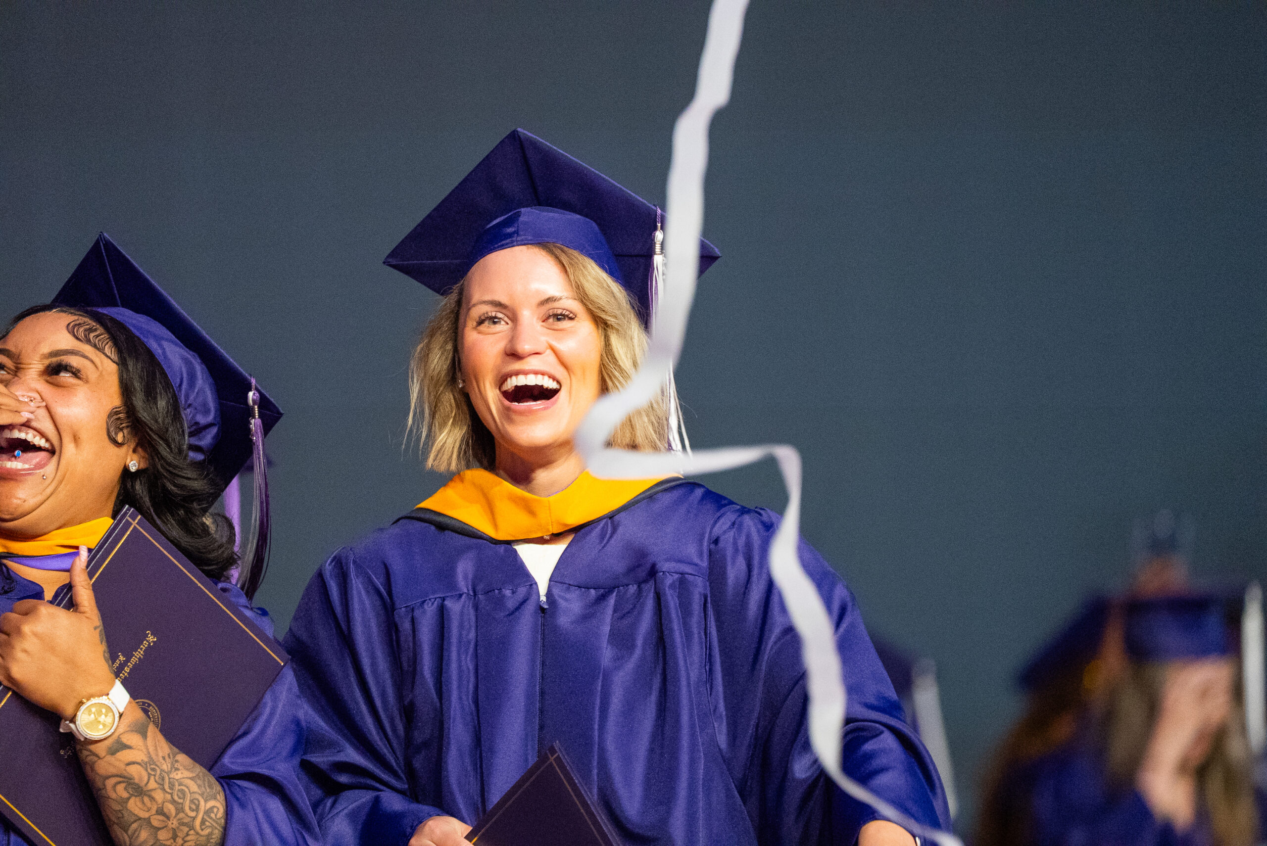 NSU Master's student celebrating at commencement