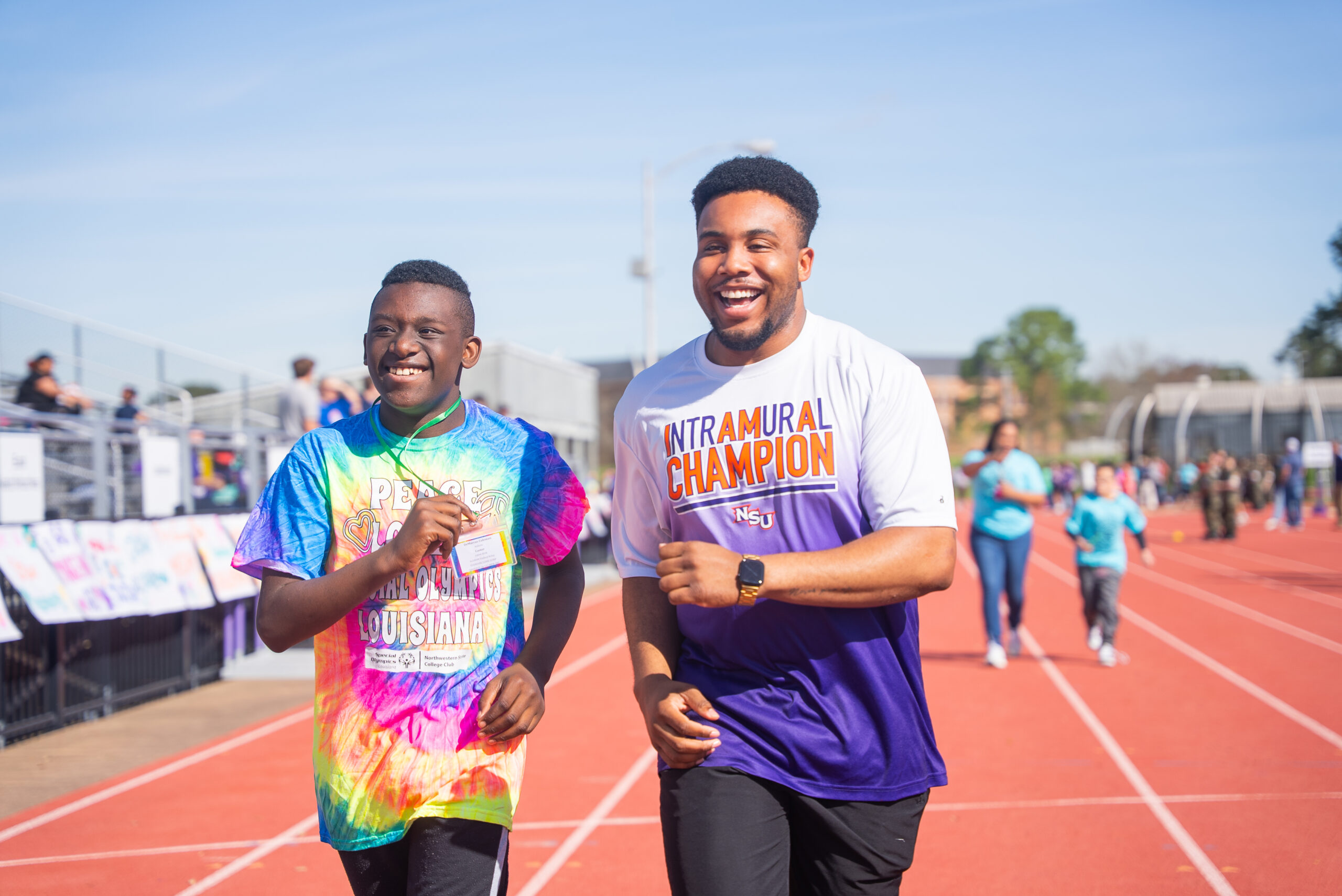 NSU student participates in Special Olympics Games with young student