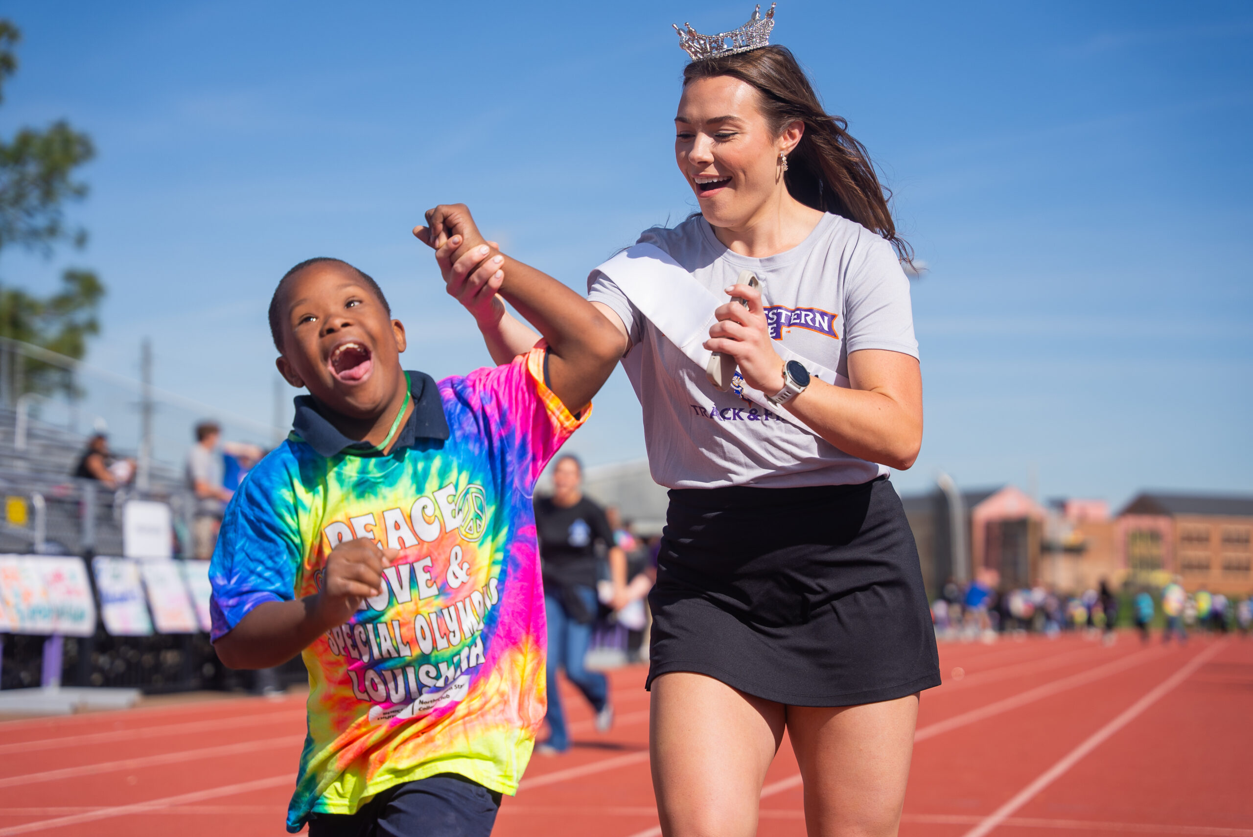 NSU student participates in Special Olympics Games with young student