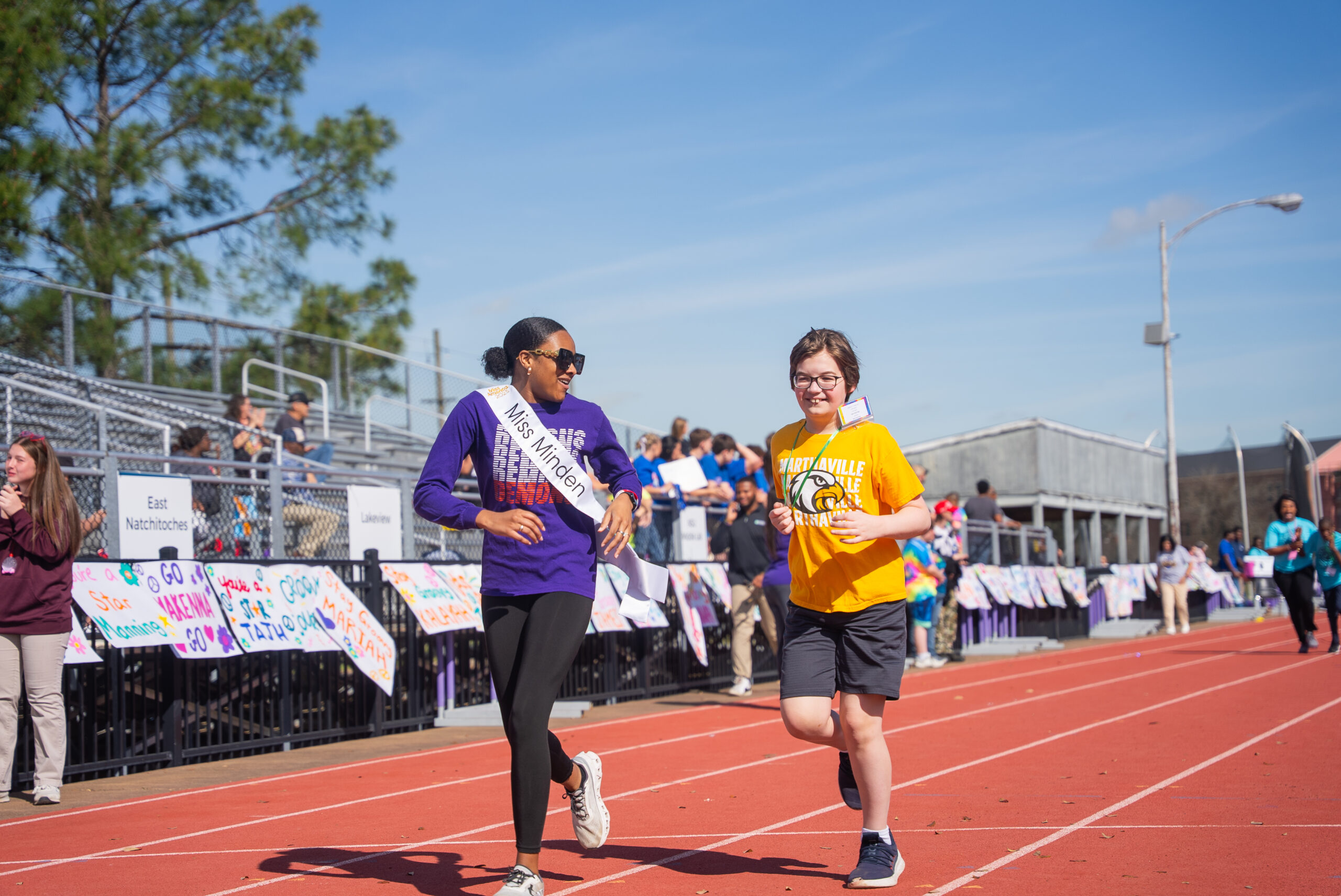 NSU student participates in Special Olympics Games with young student