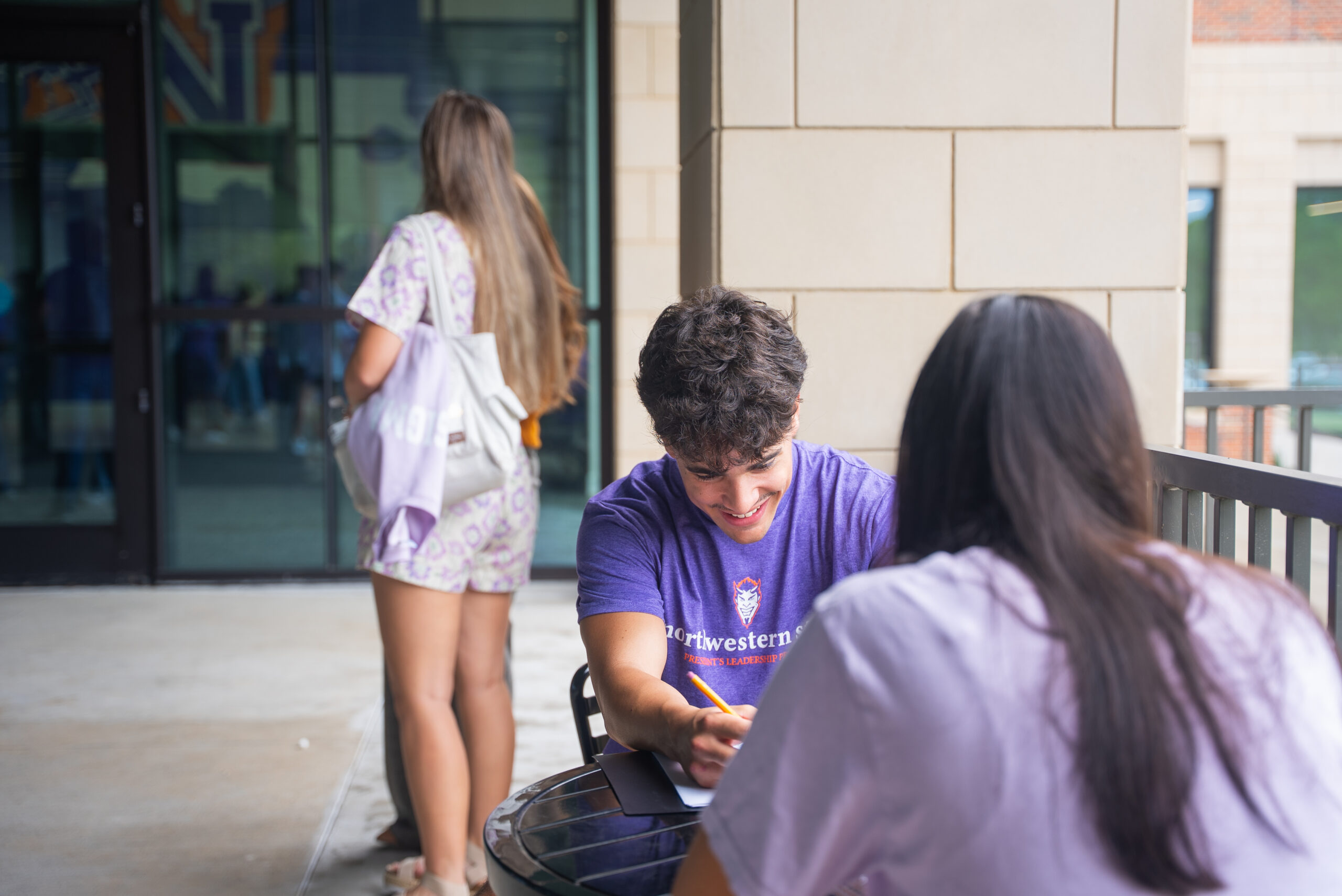 students studying on campus