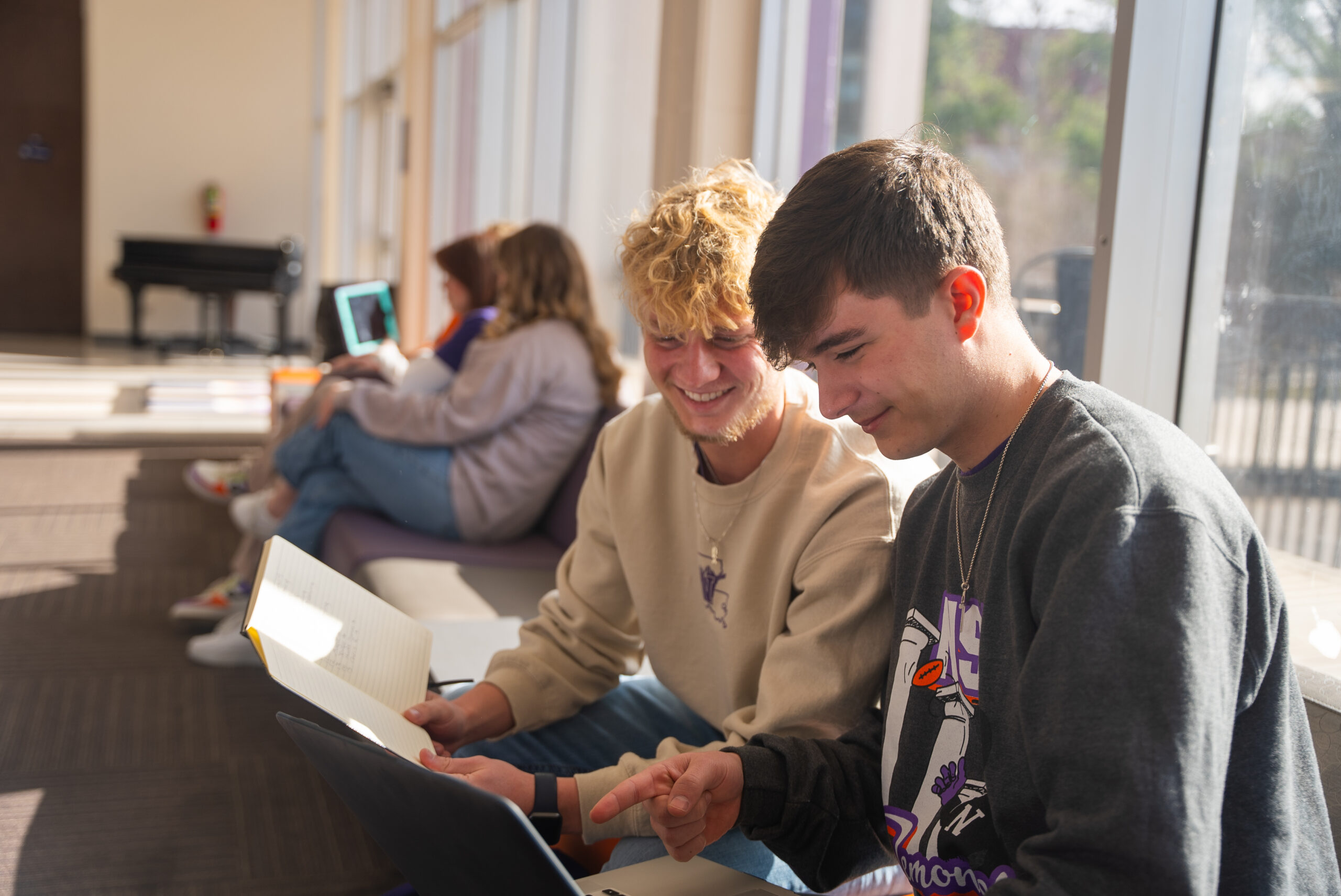 NSU students smiling in the Student Union