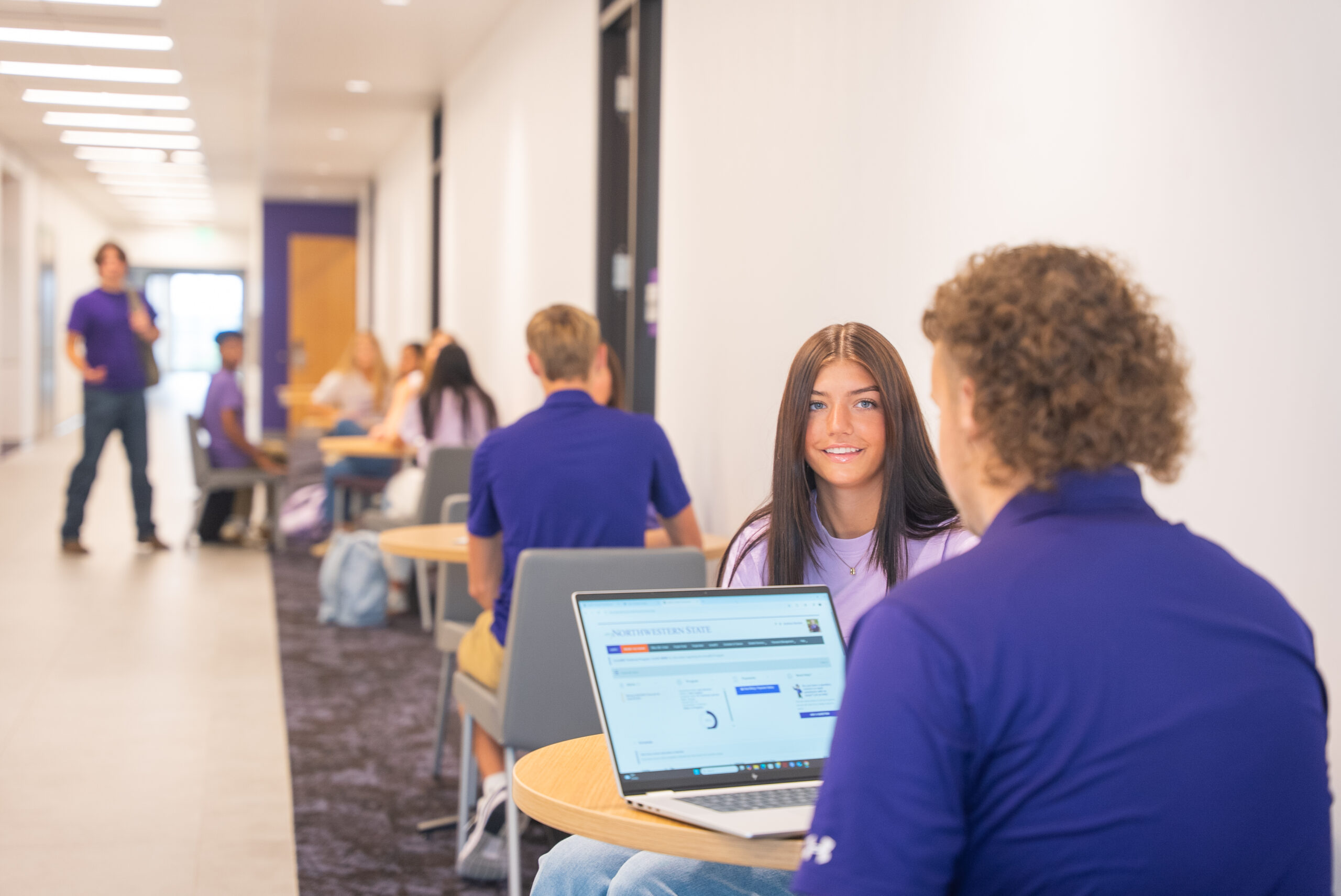 students studying on campus