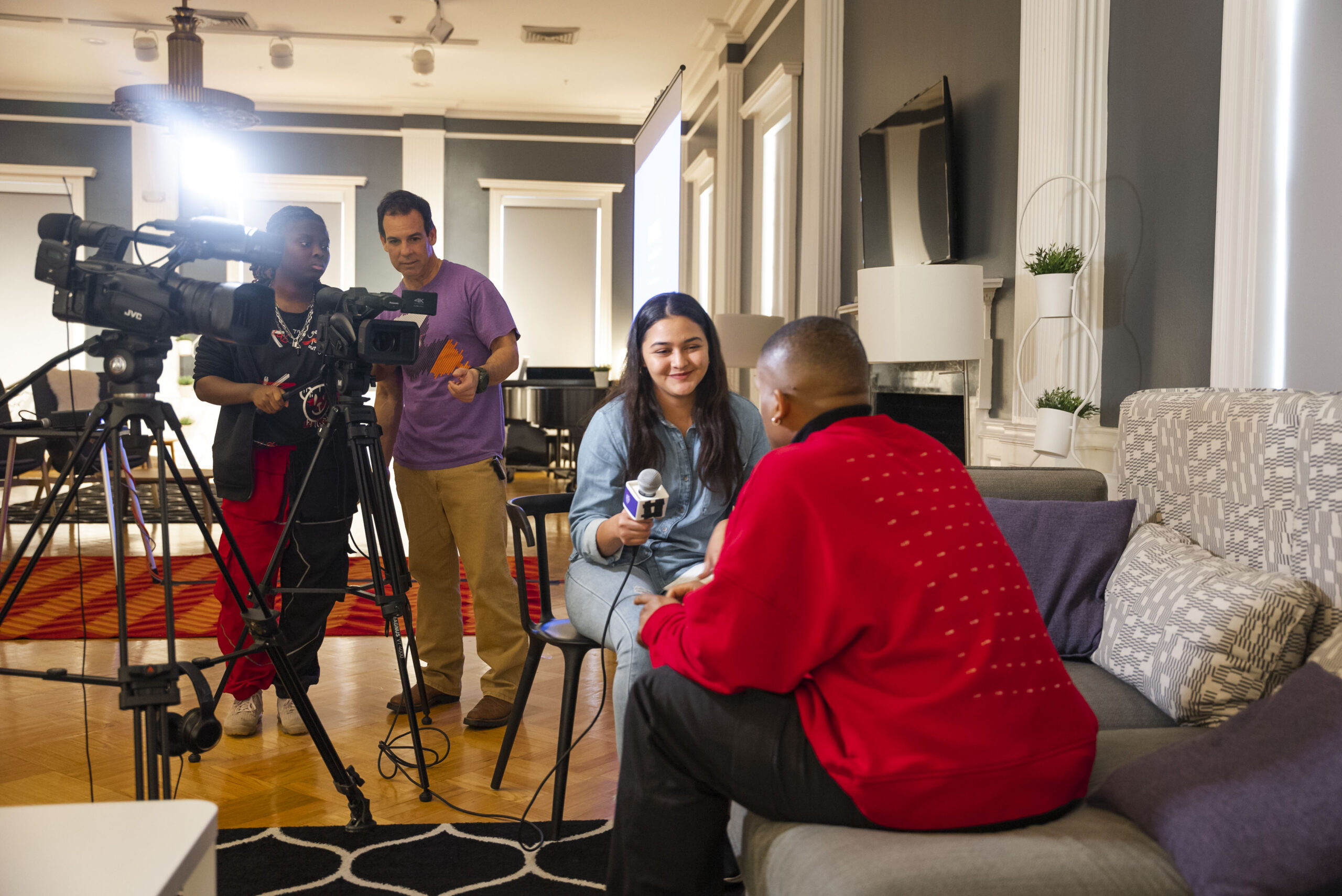 NSU Communications student completes an interview in Varnado Hall