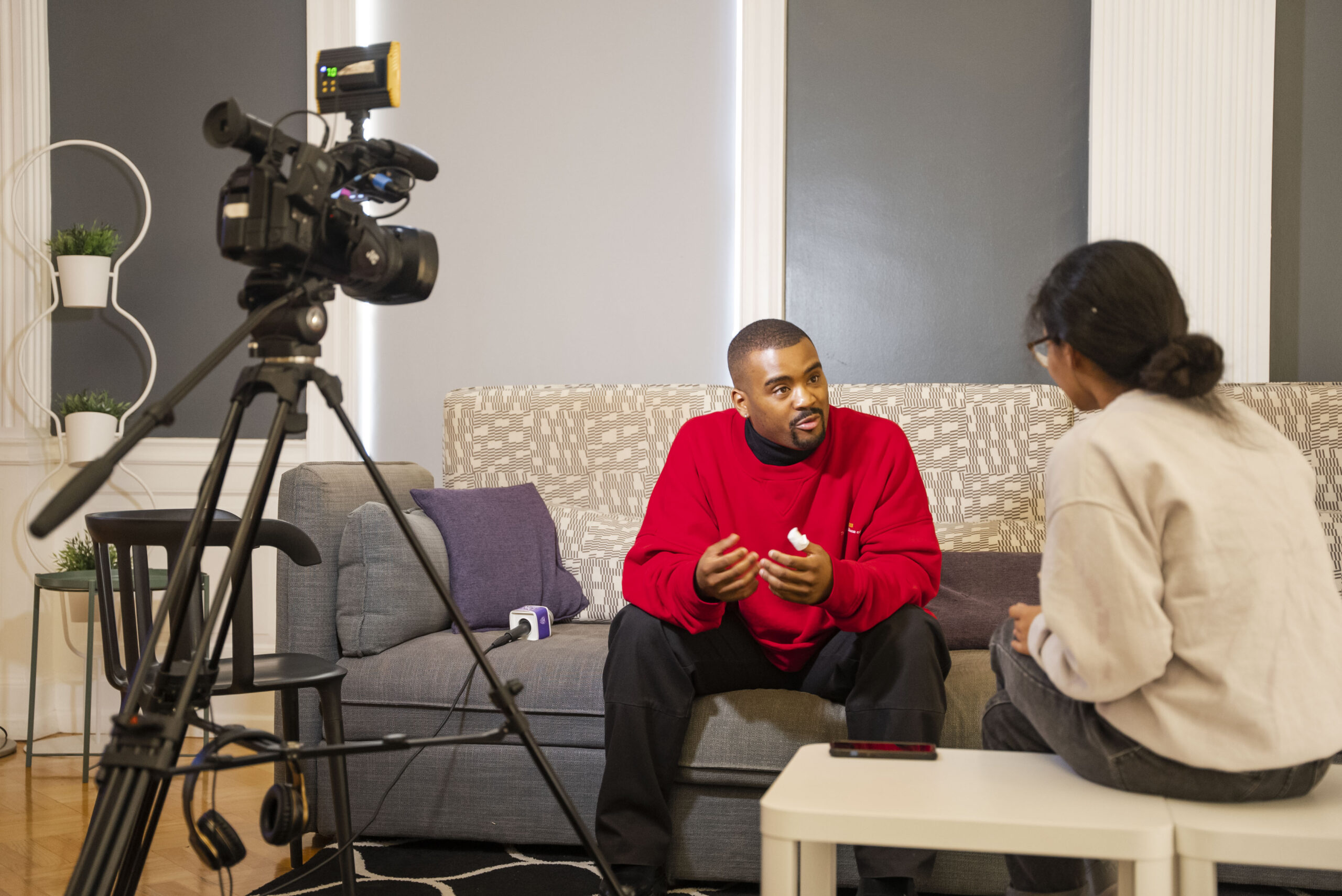 NSU Communications student completes an interview in Varnado Hall