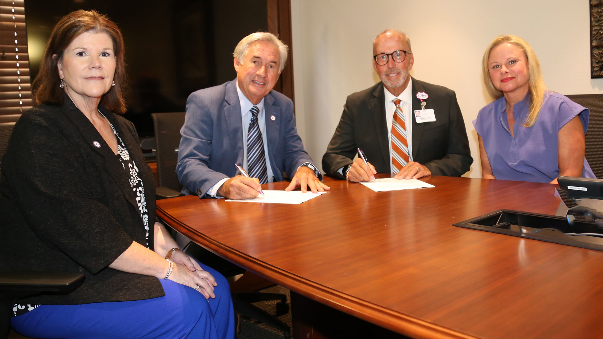 An agreement between NSU and Natchitoches Regional Medical Center will allow eligible students to receive care and medication at NRMC’s Walk-In Clinic with no co-pay or deductibles. Administrators say the public/private partnership fills a need for students in need of medical care after hours and on weekends. From left are NSU Executive Director for Economic Development and University Advancement Laurie Morrow, NSU President James Genovese, NRMC CEO Kirk Soileau and NSU Director of Health Services Jessica Nash.
