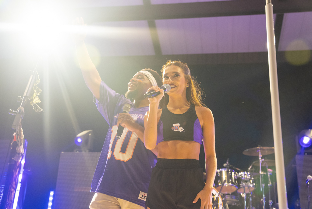 NSU students emcee pep rally on stage
