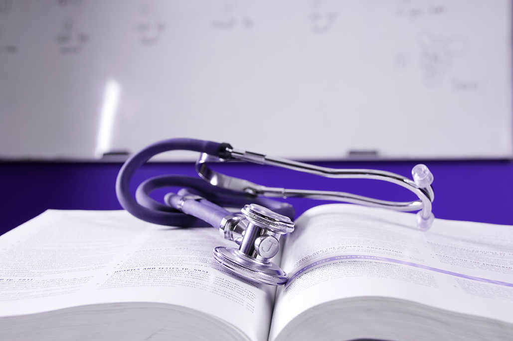 A nursing book open for studing