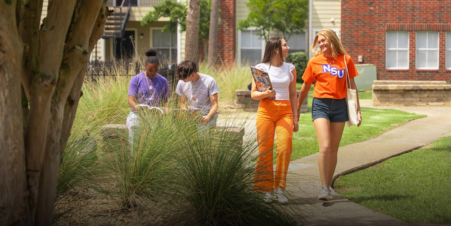 Students Walking at University Columns