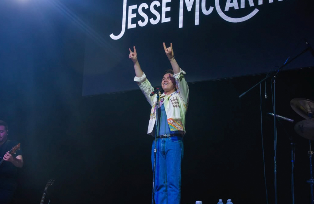 Jesse McCartney performs during Demons Come Out at Night Pep Rally