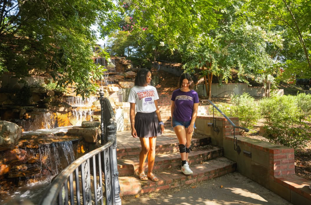 NSU students walk through downtown riverbank in Natchitoches