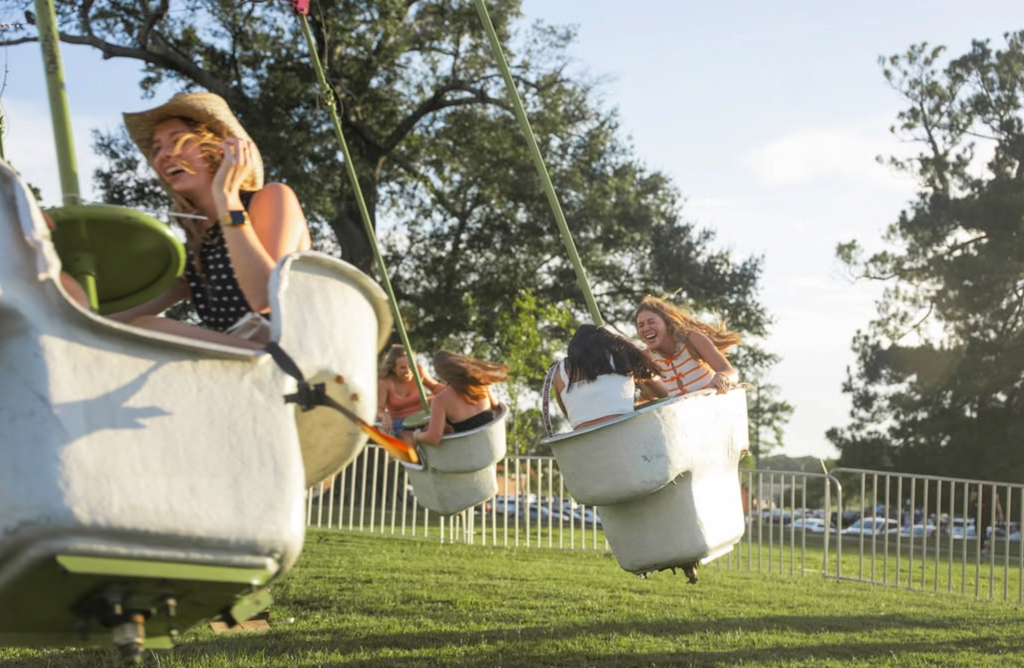 NSU students take a ride on a carnival ride during first night fest in Aug 2025