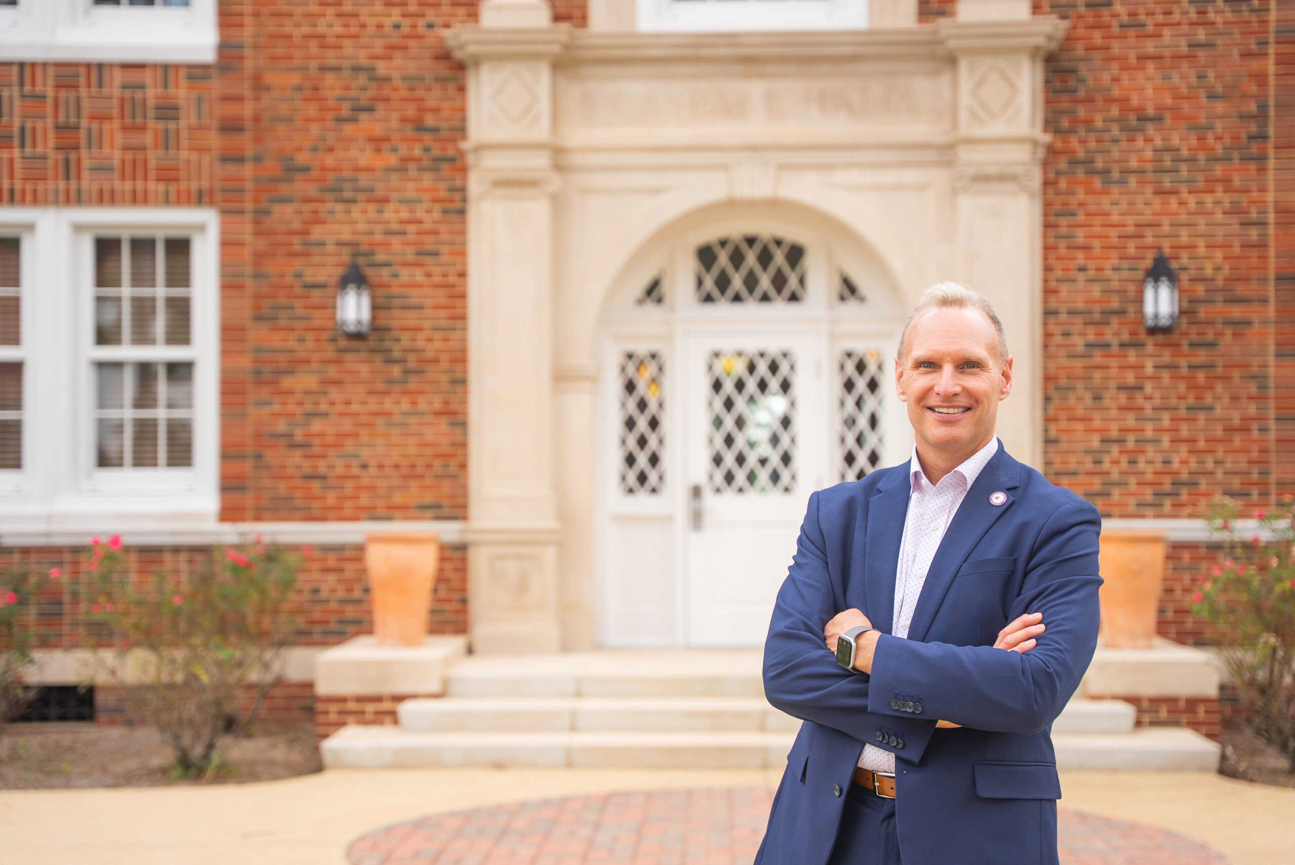 Greg Handel in front of Caspari Hall