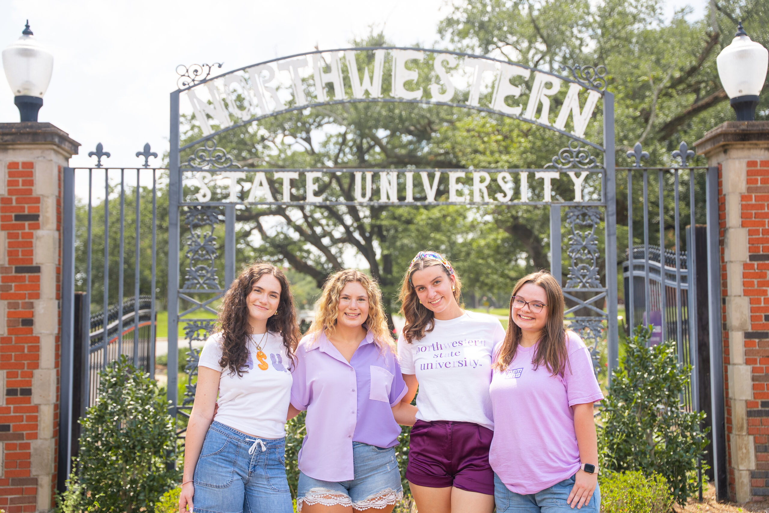 students posed on NSU's campus