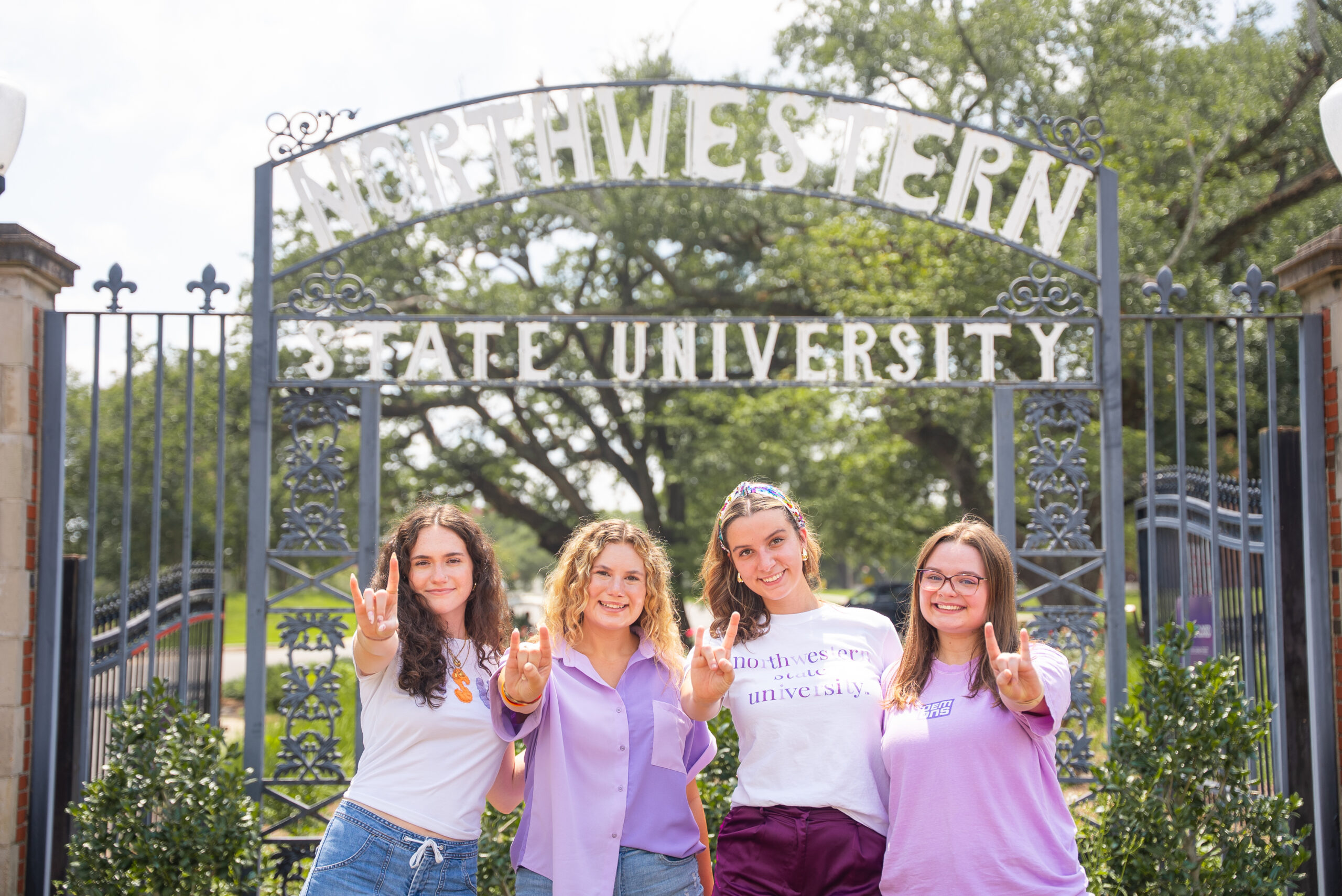 students posed on NSU's campus