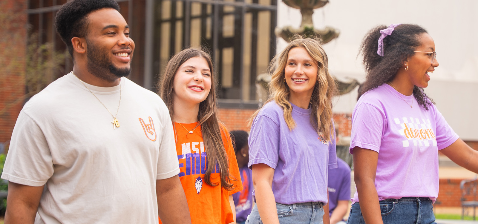 NSU students walking through Alumni Pavilion.