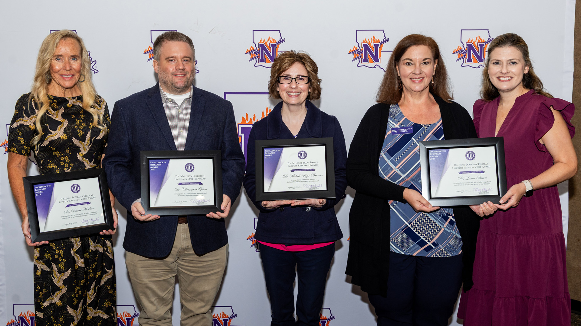 NSU faculty recognized for outstanding research were, from left, Dr. Patrice Moulton, Dr. Christopher Gilson, Dr. Michelle Fazio Brunson and, representing Dr. Laura Aaron, colleagues Becky Farmer and Dr. Kari Cook.