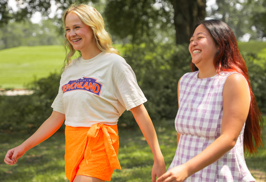 Two NSU students walk across campus near Normal Hill