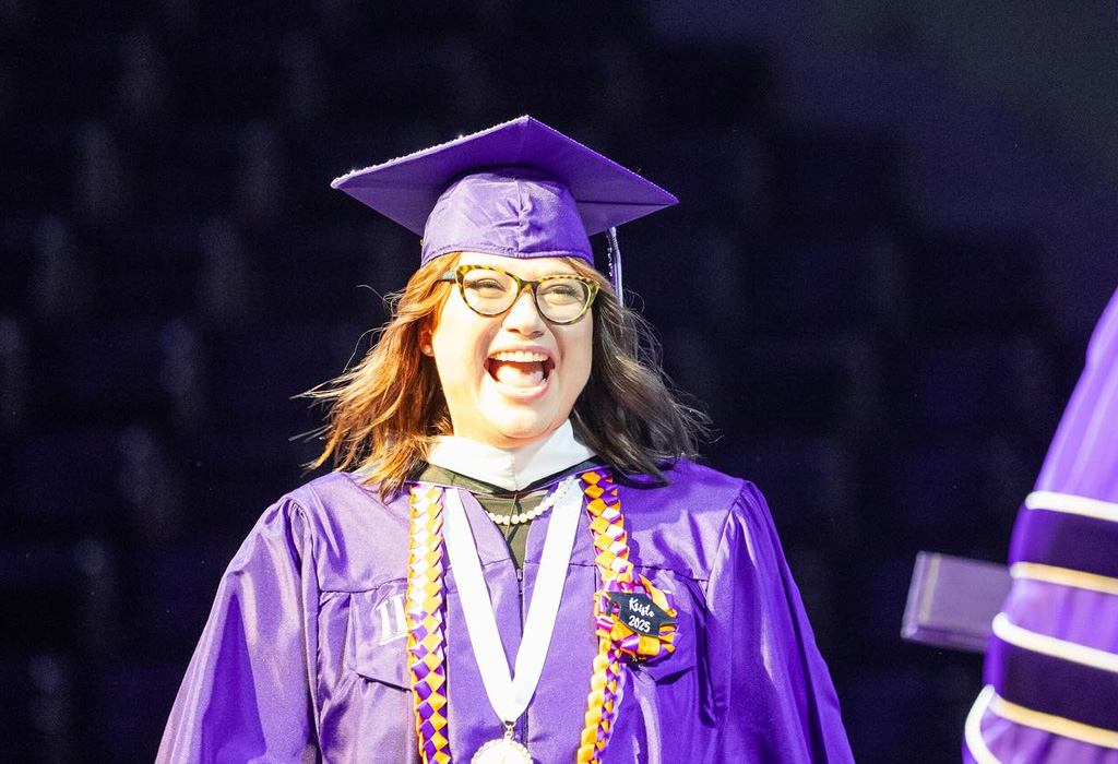NSU student walks across stage at graduation