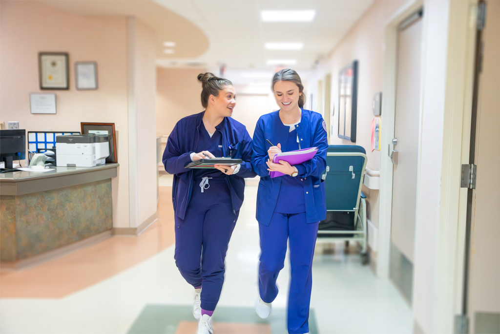 NSU students walk down hallway at medical center